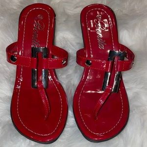 Red strappy wedge sandals